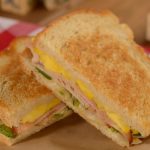 Smoked Turkey, Eggs, Swiss, Peppers, and Onions sandwich on Sourdough at Woody’s Lunch Box